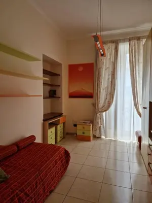 Letto o letti in una camera di Vomero Inn