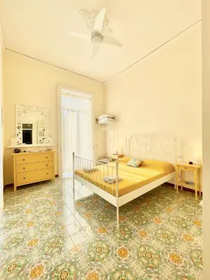 Letto o letti in una camera di CasaChi