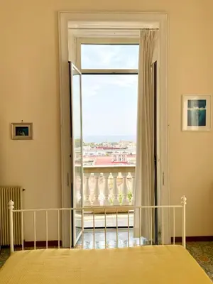 Letto o letti in una camera di CasaChi