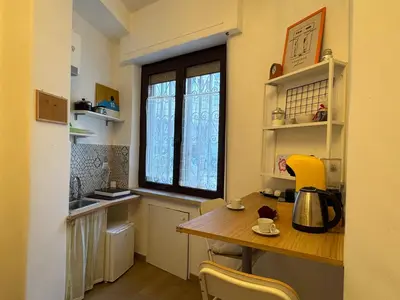 Cucina o angolo cottura di La Casa di Ciui ad un passo da Via Toledo