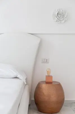 Letto o letti in una camera di Golden Suites by Dimorra