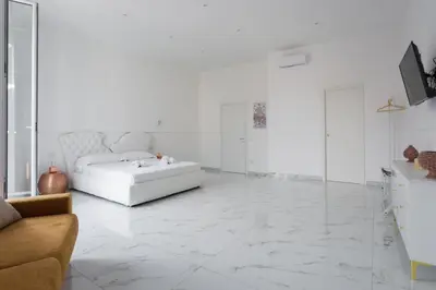 TV o dispositivi per l'intrattenimento presso Golden Suites by Dimorra