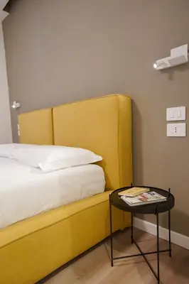 Letto o letti in una camera di B-Pizzofalcone