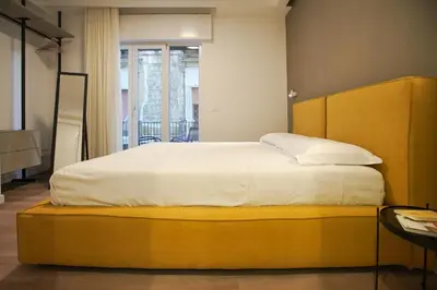 Letto o letti in una camera di B-Pizzofalcone