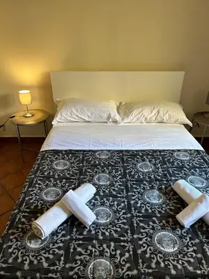 Letto o letti in una camera di AIR Decumani