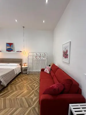 Letto o letti in una camera di Cerasella house 2 Napoli centro storico