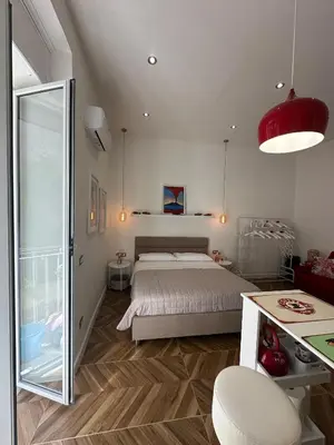 Letto o letti in una camera di Cerasella house 2 Napoli centro storico