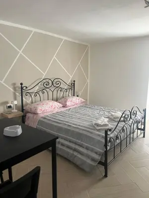 Letto o letti in una camera di A cas è mammà