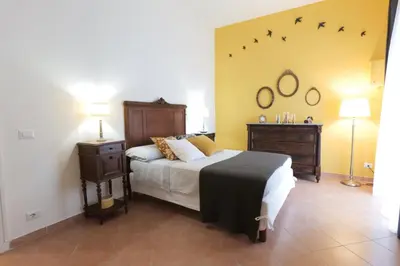 Letto o letti in una camera di Il tempo ritrovato Casa Vacanze