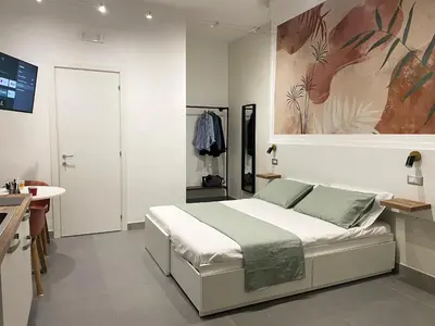 Letto o letti in una camera di Inner Naples 2.0