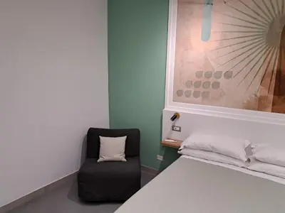 Letto o letti in una camera di Inner Naples 2.0