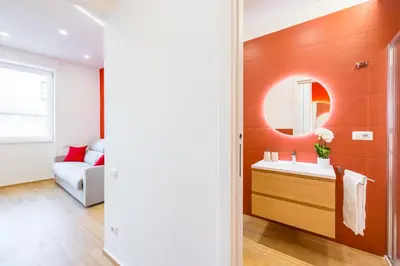 Letto o letti in una camera di NUOVO appartamento nel cuore di Napoli AT TWENTY ONE - CORAL