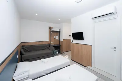 Letto o letti in una camera di Mia Suites Beverello