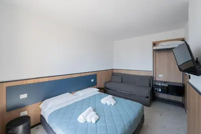 Letto o letti in una camera di Mia Suites Beverello