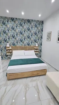 Letto o letti in una camera di Tre perle house