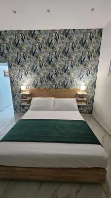 Letto o letti in una camera di Tre perle house