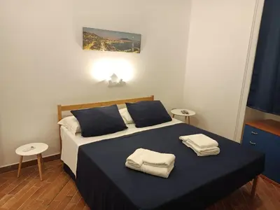 Letto o letti in una camera di Dimora Belvedere
