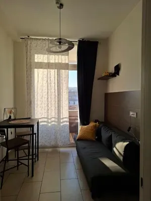 Area soggiorno di Faccia Gialla Napoli Casa Vacanze