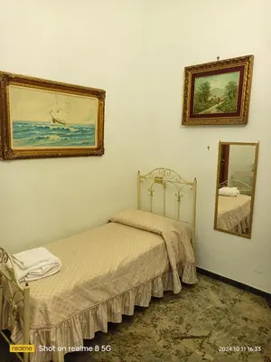 Letto o letti in una camera di Da Francy B&b