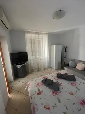 Letto o letti in una camera di Annarella Home