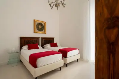 Letto o letti in una camera di Chiaia Luxury Apartment