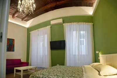 Letto o letti in una camera di Centro Storico Rooms