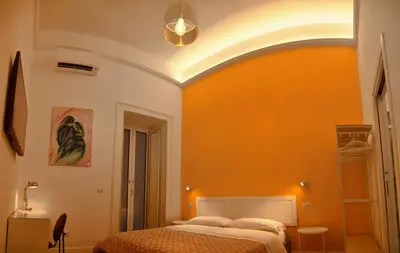 Letto o letti in una camera di Centro Storico Rooms