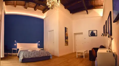 Letto o letti in una camera di Centro Storico Rooms