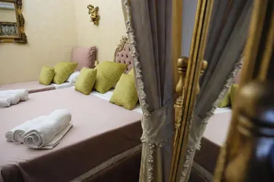 Letto o letti in una camera di La Bella Napoli Home Room di Adriana