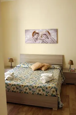 Letto o letti in una camera di L'Oasi del Re - Apartment