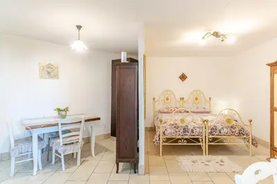 Letto o letti in una camera di La perla del Vesuvio