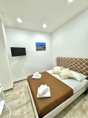 Letto o letti in una camera di Ilarys home