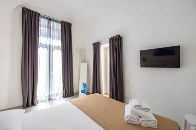 TV o dispositivi per l'intrattenimento presso Maison Emanuele Double Apartment