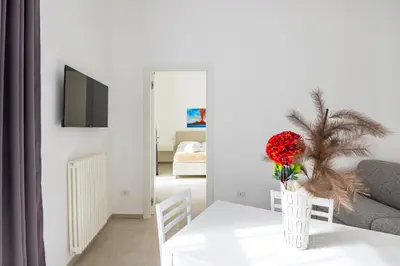 TV o dispositivi per l'intrattenimento presso Maison Emanuele Double Apartment