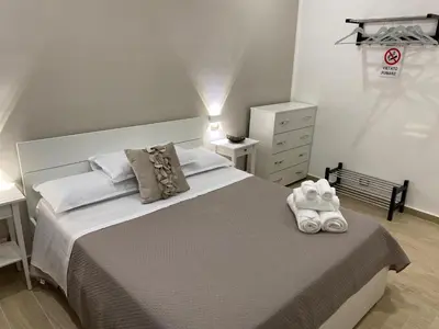 Letto o letti in una camera di B&B Civico 22 Silvestre