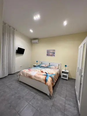 Letto o letti in una camera di Ancora D'Oro