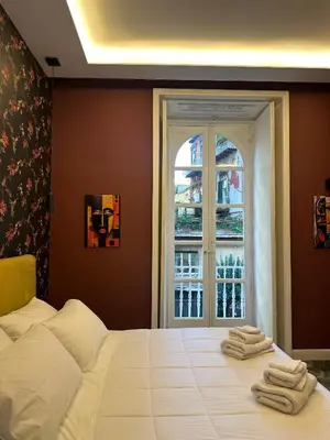 Letto o letti in una camera di Arco del Gigante