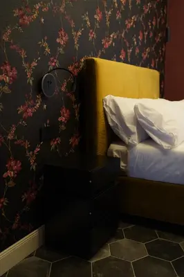 Letto o letti in una camera di Arco del Gigante