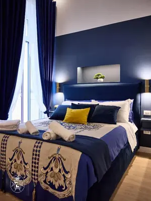 Letto o letti in una camera di Vista Piazza dei Martiri