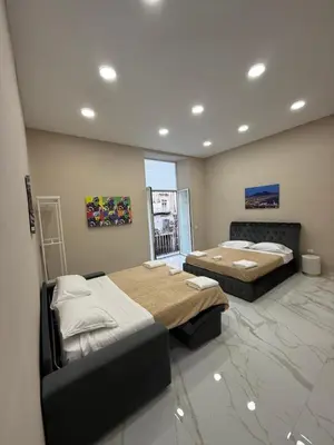 Letto o letti in una camera di Valentino caracciolo 105