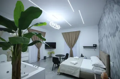 Letto o letti in una camera di Il Ritrovo Spa&Rooms