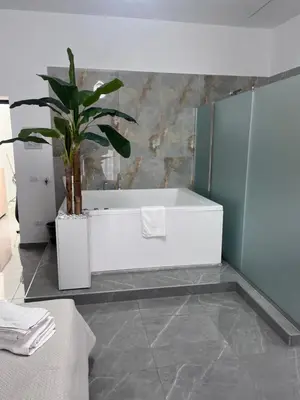 Letto o letti in una camera di Il Ritrovo Spa&Rooms
