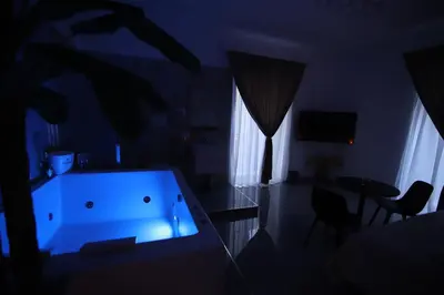 Letto o letti in una camera di Il Ritrovo Spa&Rooms