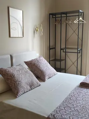 Letto o letti in una camera di Ta-49 bed e breakfast
