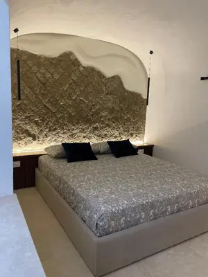 Letto o letti in una camera di Domus Parthenope Deluxe