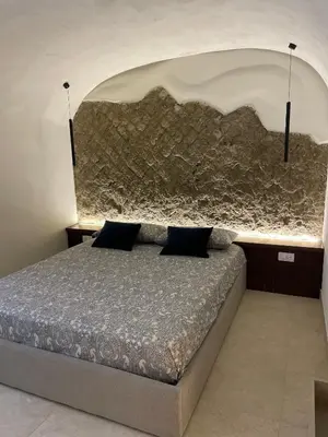 Letto o letti in una camera di Domus Parthenope Deluxe
