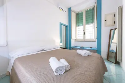 Letto o letti in una camera di Duomo Flat Napoli