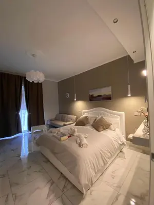 Letto o letti in una camera di LA DIMORA DI MARTI 