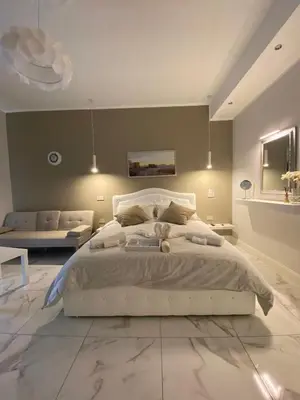 Letto o letti in una camera di LA DIMORA DI MARTI 