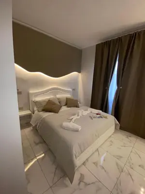 Letto o letti in una camera di LA DIMORA DI MARTI 